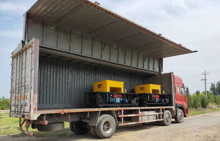 Slipform curb machine delivery