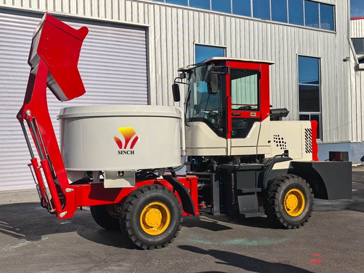 Self loading pan mixer