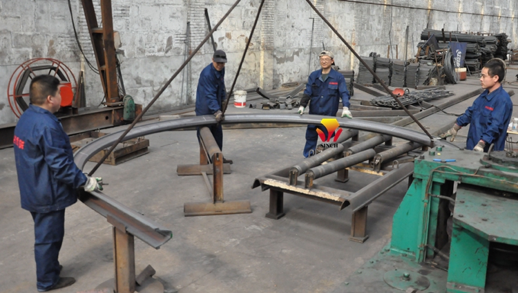 Hydraulic beam bending machine